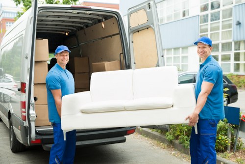 Movers assisting a Wapping apartment relocation near the river
