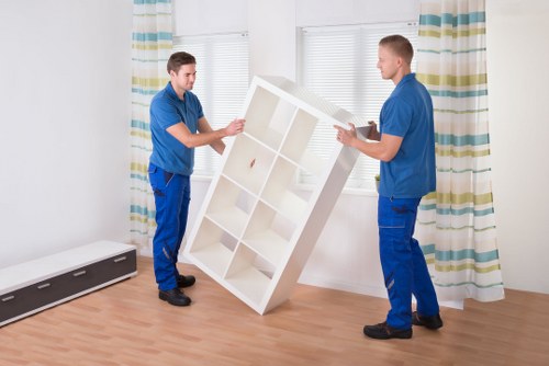 Local team collecting sofas, beds, and wardrobes in Wapping