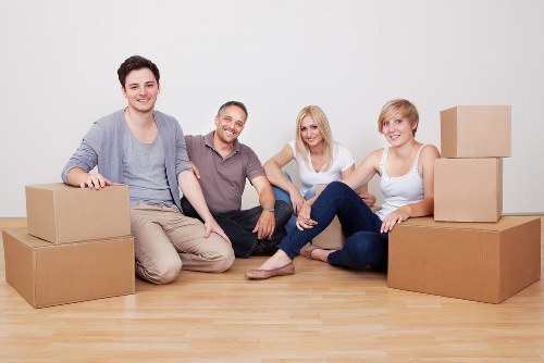 Packed office boxes and furniture ready for relocation