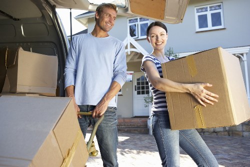 Professional movers handling a flat move in Wapping with care
